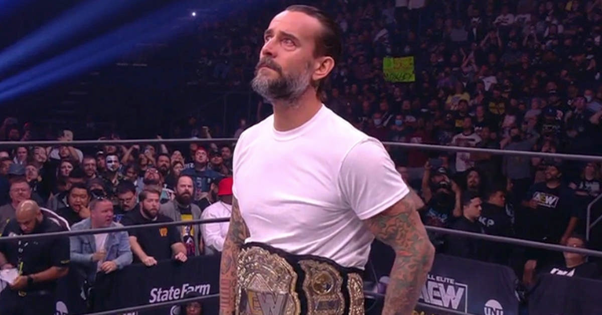 Cm punk z pasem mistrzowskim