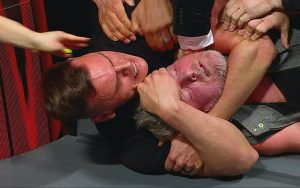 gunther-goes-berserk-choking-out-pat-mcafee-during-421-wwe-raw-13